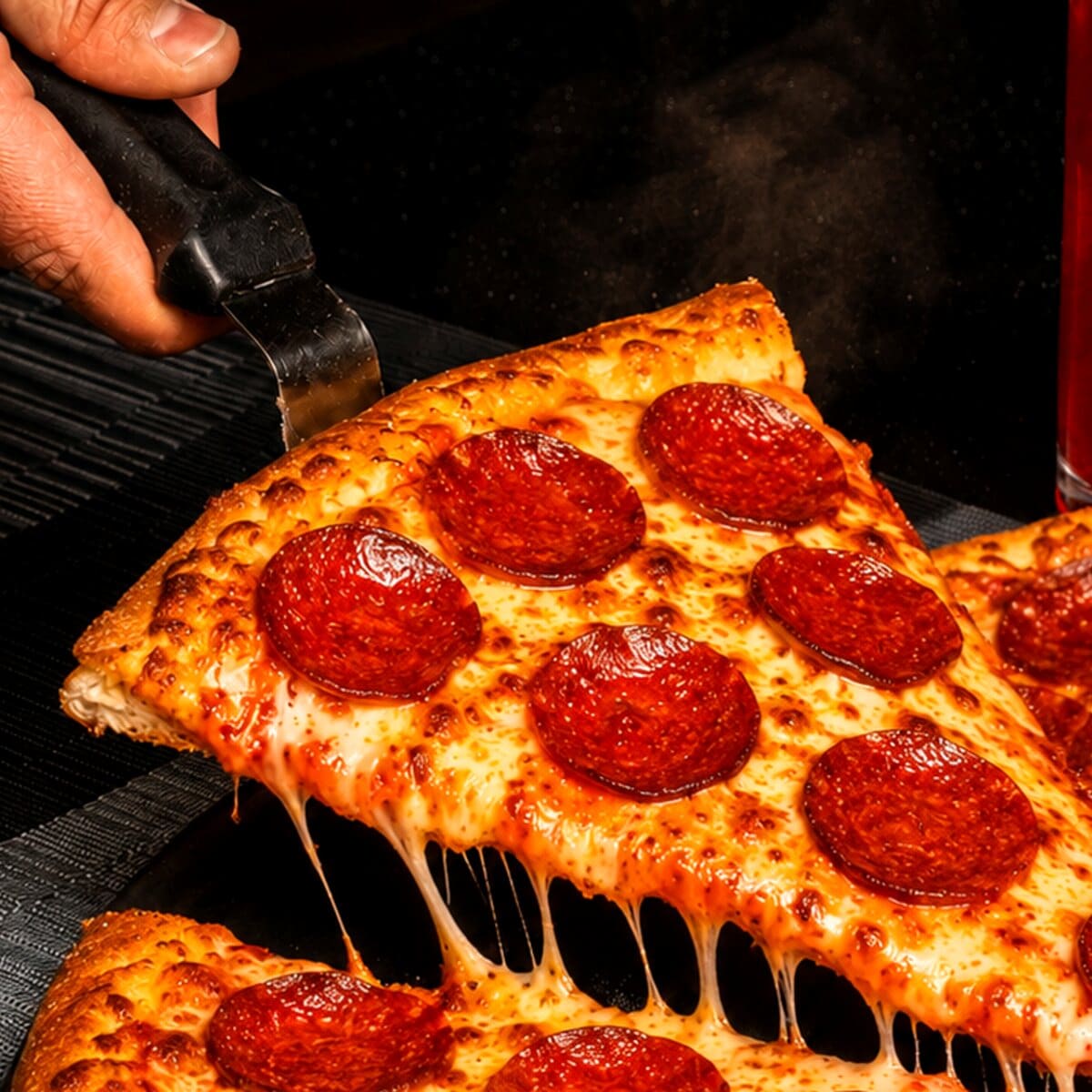 Stone-fired pepperoni pizza from Tuscan Cove Bar & Patio